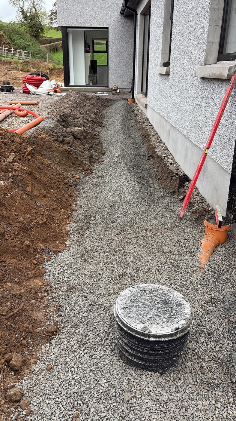 Site drainage and gravel path installation